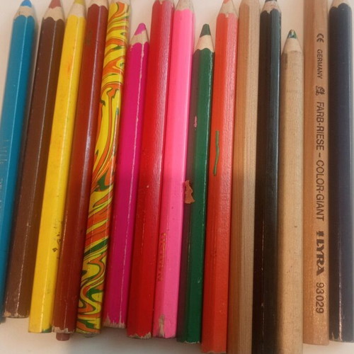 Set of colored thick pencils used
