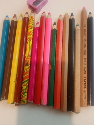 Set of colored thick pencils used
