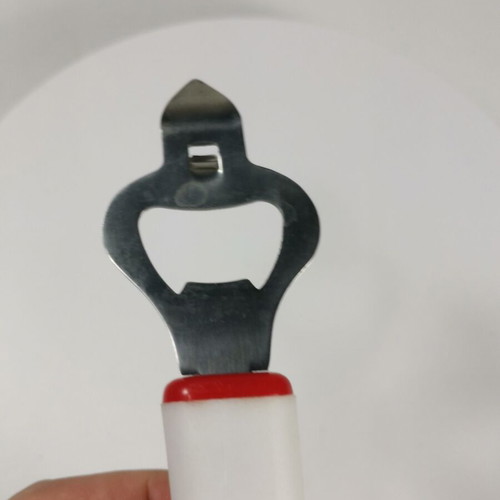 Promotional bottle opener from TOP vinegar used
