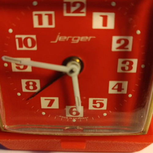 Jerger travel clock used with alarm