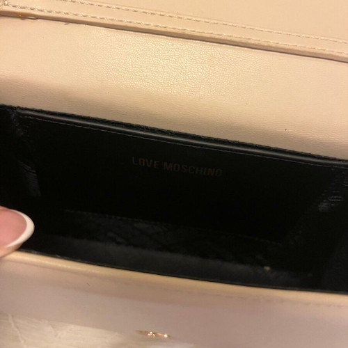 Love Moschino clutch handbag used, beige with black handle