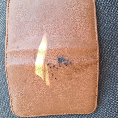 Skin and nail care tools set in small brown case