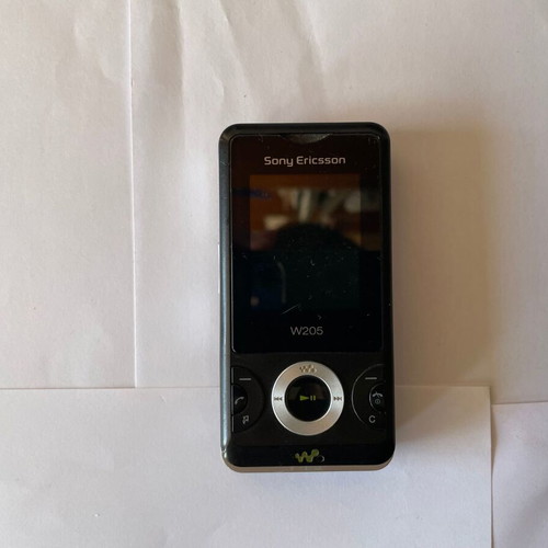 Sony Ericsson W205 used mobile phone with charger without battery
