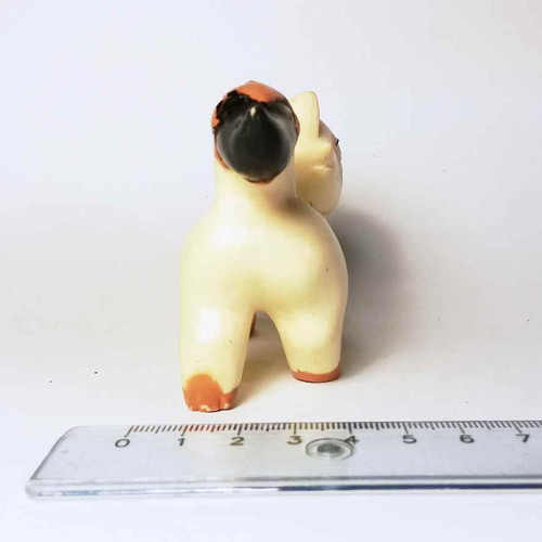 Sagwa plastic figure used with scratches and marks