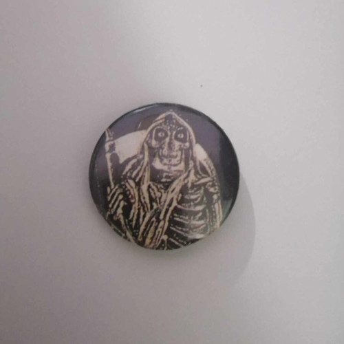 Badge used, black and white