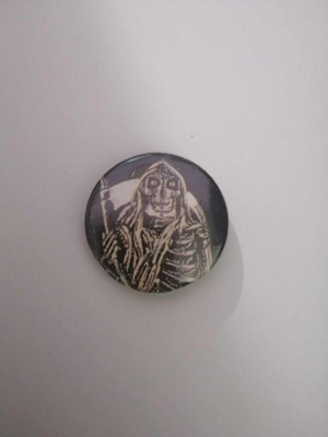 Badge used, black and white