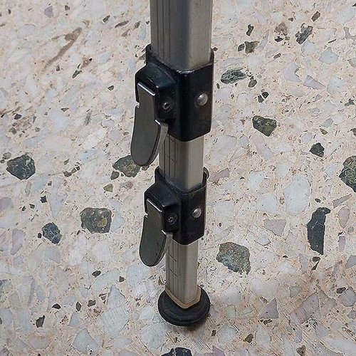 Professional aluminum photographic tripod used