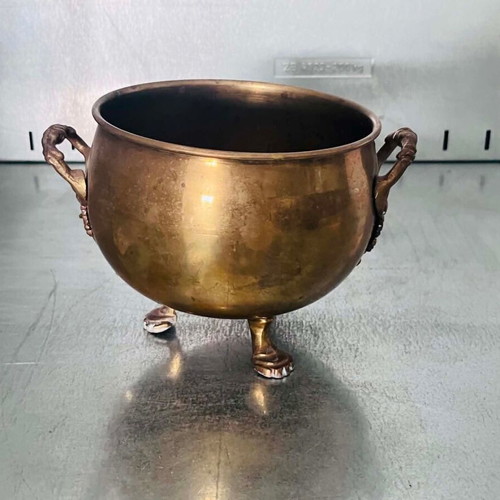 Vintage brass planter with lion claw feet used