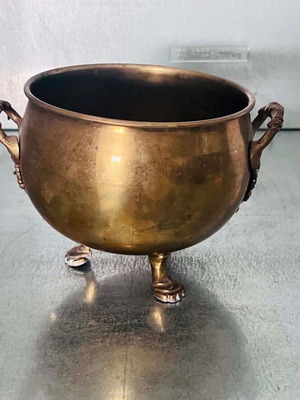 Vintage brass planter with lion claw feet used
