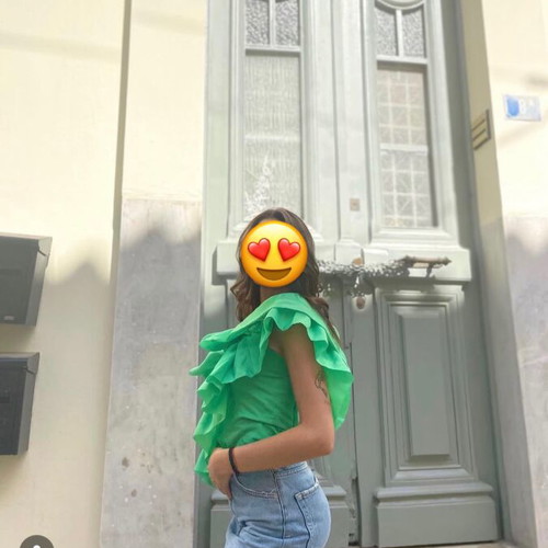 Green blouse with ruffles