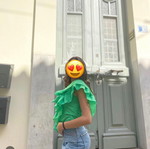 Green blouse with ruffles
