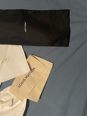 Authentic dust covers and pouches new, sold together