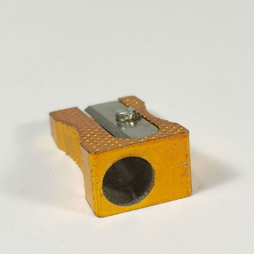 Vintage metal pencil sharpener used, orange gold, Made in Germany