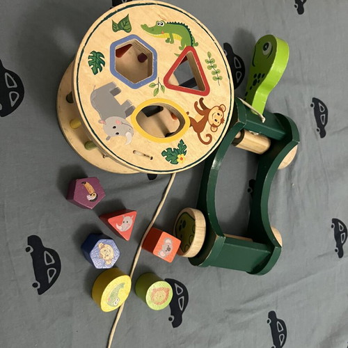 Wooden developmental toy with shapes, animals and colors like new