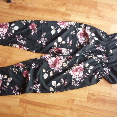 MELA LONDON floral print black jumpsuit medium used