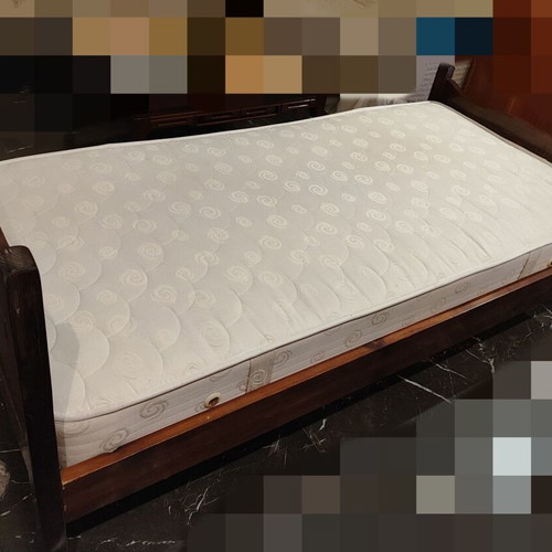 Solid wood single bed with clean mattress