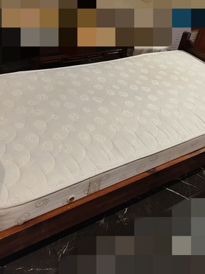 Solid wood single bed with clean mattress