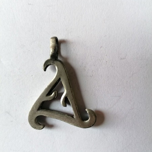 Metal tribal triangle pendant new with matte finish