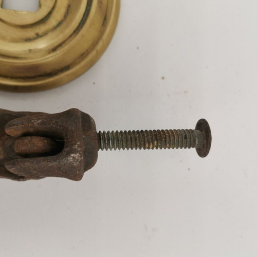 Bronze hand door knocker used from 1930 preserved door