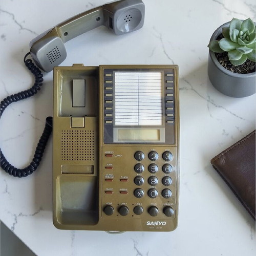 Sanyo ADX 66 phone used, vintage, brown, wired