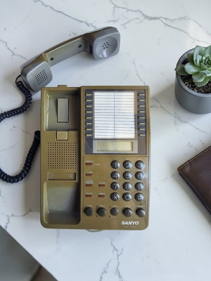 Sanyo ADX 66 phone used, vintage, brown, wired