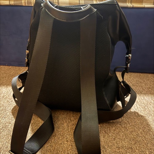 Leather backpack like new, black with orange lining