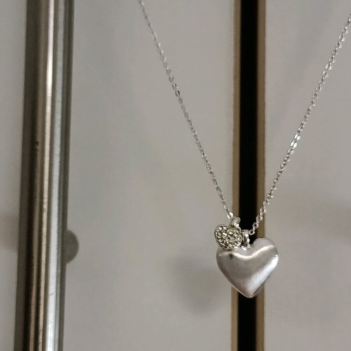 Necklace with two hearts new, lustrous and with stones
