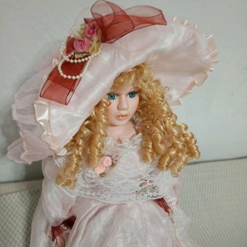 Porcelain doll 50cm new