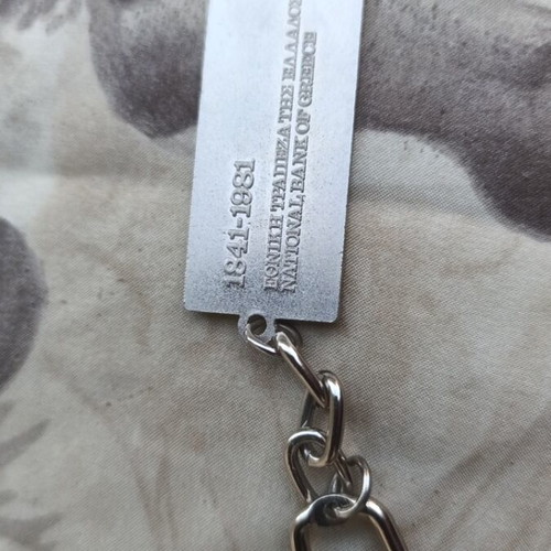 National Bank of Greece metal souvenir keychain with embossed historic building
