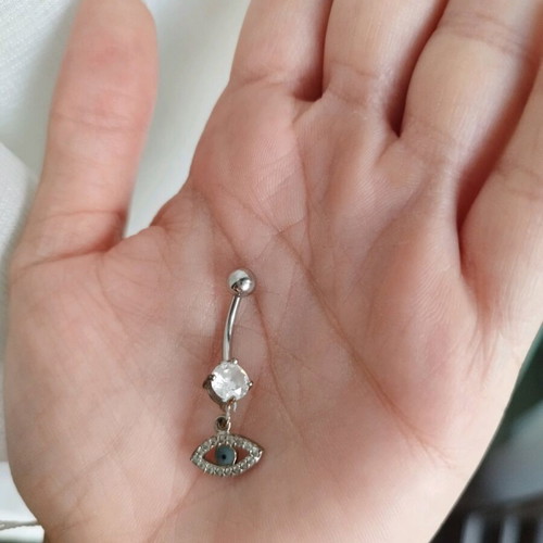 Navel piercing like new with eye charm and silver diamond