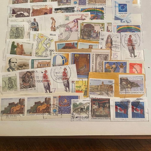Stamp collection used with album, over 500 pieces