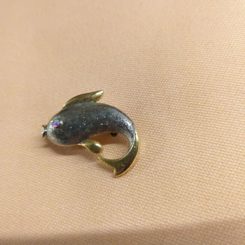 Dolphin pin used, silver and gold color