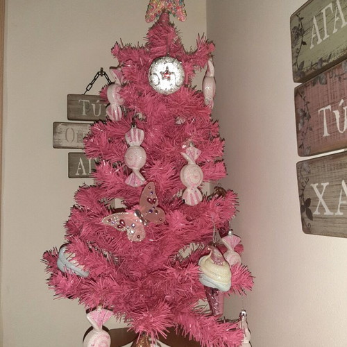 Small Christmas tree with ornaments like new