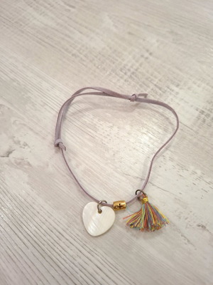Women's heart bracelet with leather cord like new, multicolor