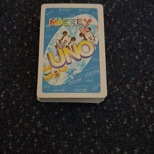 Uno Mickey card game like new with 54 cards