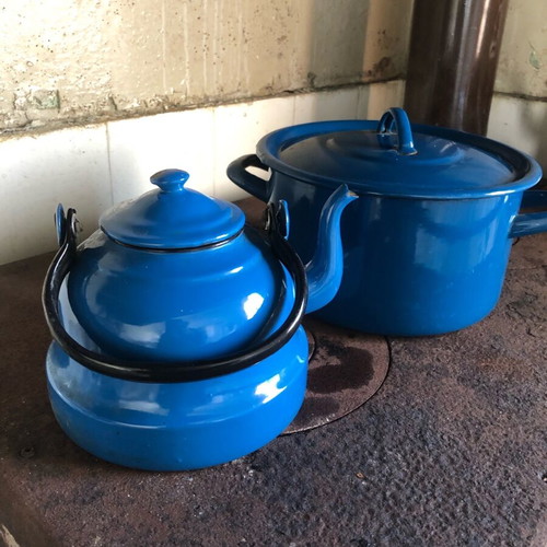 Enamel cookware set used, teapot and pot
