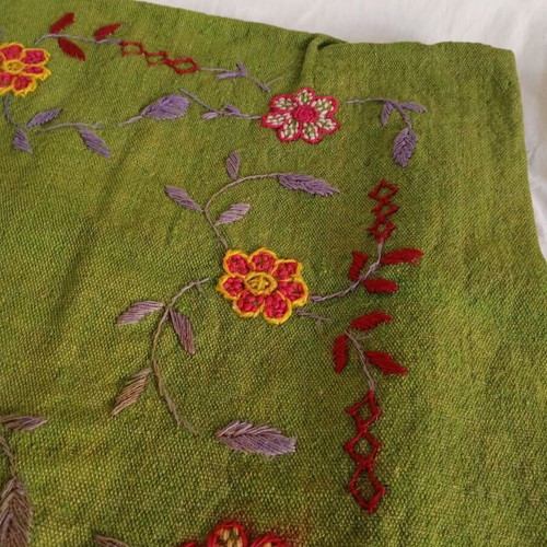 Embroidered green pillowcase used with details