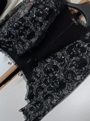 Lace bolero used with sequins and lace