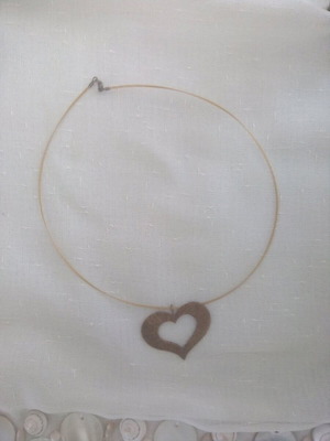 Pendant like new, gold with silver inside