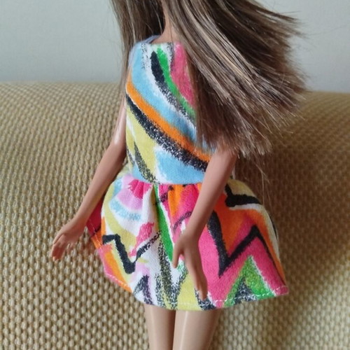 Barbie Fashionistas doll like new with colorful geometric dress and orange boots