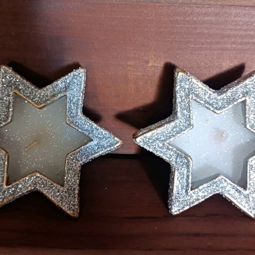 Christmas candles in clay stars with silver glitter new