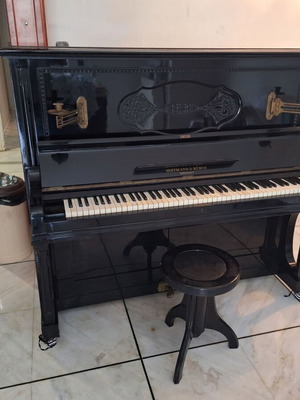 Upright piano used ebony 1940 needs service