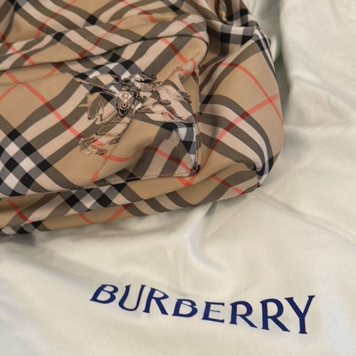 Burberry backpack like new with 2 zippered compartments and adjustable straps