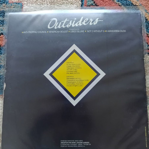 Outsiders vinyl like new, rock