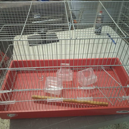 Birdcage for pet songbirds almost like new, dimensions 60x40x34 cm with three feeders
