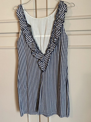 Mini dress black and white with back opening and ruffles like new