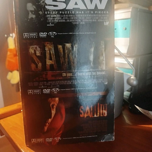 Saw trilogy DVD used, subtitles, horror thriller