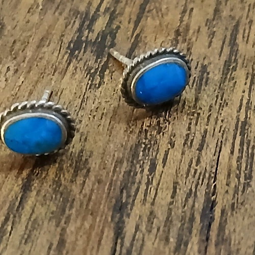 Vintage women's earrings with blue stone used