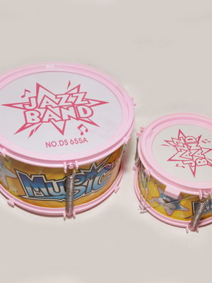 Percussion toys used with hard plastic case and puzzle cube