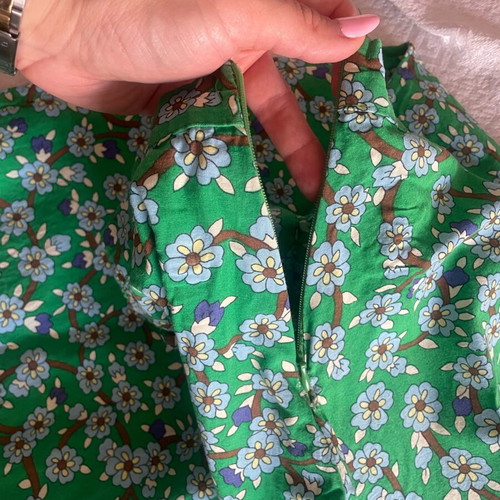 D&K skirt like new with front slit and decorative buttons, white and green
